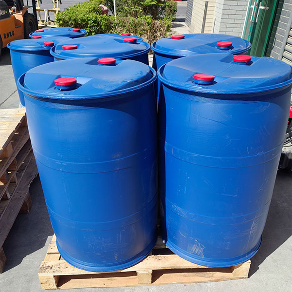 Multiple acrylic acid drums ready for bulk shipment